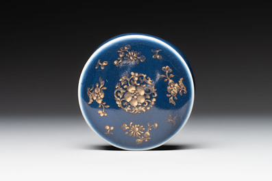 A Chinese gilt-decorated blue-ground jar and cover with floral design, Qianlong