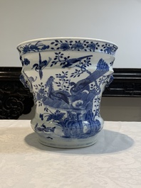 A pair of Chinese blue and white 'birds among flowering branches' jardini&egrave;res, 19th C.