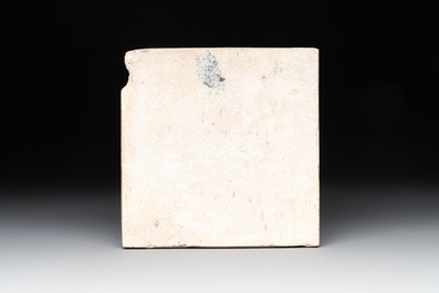 16 blue and white Dutch Delft tiles and one manganese 'ship' tile, 18th C.