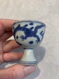 Six Chinese blue and white 'Hatcher cargo' stem cups with dragons, Transitional period