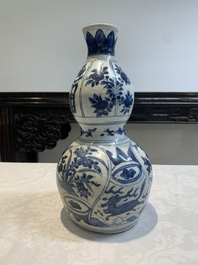 A Chinese blue and white 'flying horse' double gourd vase, Wanli