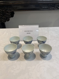 Six Chinese blue and white 'Hatcher cargo' stem cups with dragons, Transitional period