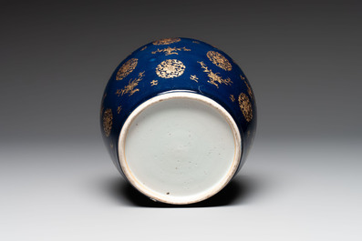 A Chinese gilt-decorated blue-ground jar and cover with floral design, Qianlong