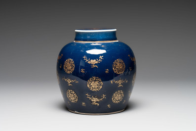 A Chinese gilt-decorated blue-ground jar and cover with floral design, Qianlong
