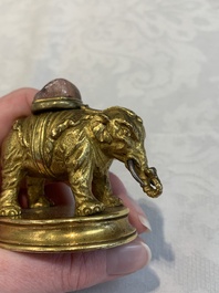 A Chinese pink quartz-inset gilt bronze elephant, 18th C.