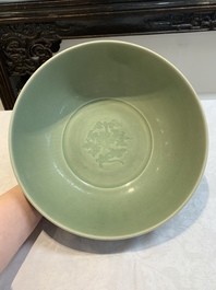 A Chinese Longquan celadon bowl with 'anhua' floral design, Ming