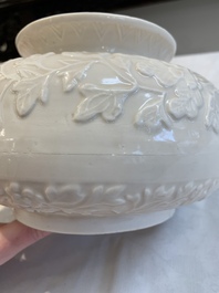 A rare Chinese Dehua blanc de Chine vase with floral design, Kangxi