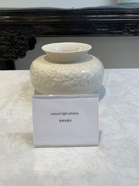 A rare Chinese Dehua blanc de Chine vase with floral design, Kangxi