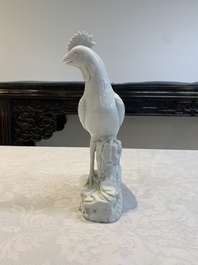 A pair of Chinese Dehua blanc de Chine models of roosters, 18th C.