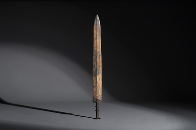 A rare Chinese turquoise-inlaid parcel-gilt bronze sword, Zhou