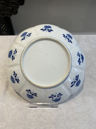 Six Chinese blue and white 'lotus' plates, Kangxi