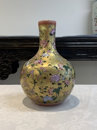 A Chinese gilt-ground famille rose vase with floral design, Qianlong mark and possibly of the period