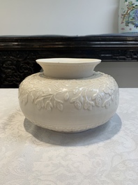 A rare Chinese Dehua blanc de Chine vase with floral design, Kangxi