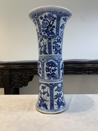 A Chinese blue and white 'gu' vase with floral design, Kangxi