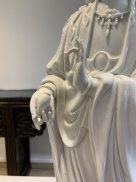 A large Chinese Dehua blanc de Chine figure of Guanyin, 19/20th C.
