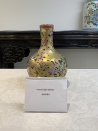 A Chinese gilt-ground famille rose vase with floral design, Qianlong mark and possibly of the period
