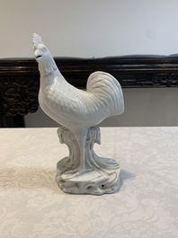 A pair of Chinese Dehua blanc de Chine models of roosters, 18th C.