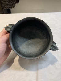 A Chinese bronze censer with Xuande mark and an archaistic vessel, 18/19th C.