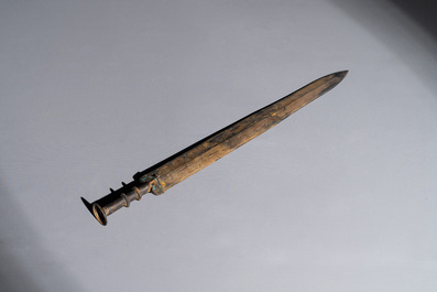 A rare Chinese turquoise-inlaid parcel-gilt bronze sword, Zhou