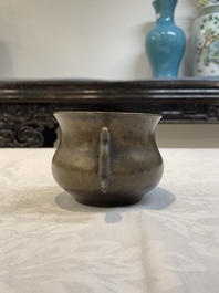 A Chinese bronze censer with Xuande mark and an archaistic vessel, 18/19th C.