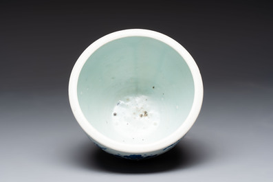 A Chinese blue and white 'Buddhist lion and elephant' scroll jar or jardini&egrave;re, Transitional period