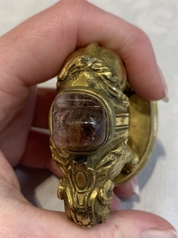 A Chinese pink quartz-inset gilt bronze elephant, 18th C.