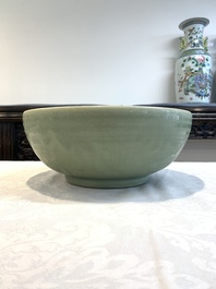 A Chinese Longquan celadon bowl with 'anhua' floral design, Ming