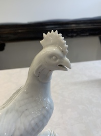 A pair of Chinese Dehua blanc de Chine models of roosters, 18th C.