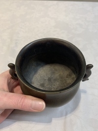 A Chinese bronze censer with Xuande mark and an archaistic vessel, 18/19th C.