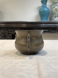 A Chinese bronze censer with Xuande mark and an archaistic vessel, 18/19th C.