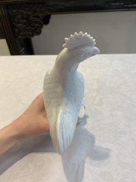 A pair of Chinese Dehua blanc de Chine models of roosters, 18th C.
