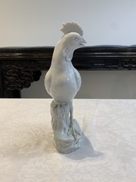 A pair of Chinese Dehua blanc de Chine models of roosters, 18th C.