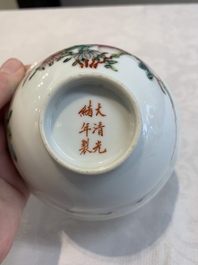 Four Chinese famille rose bowls and a blue and white bowl, Guangxu mark, 19/20th C.
