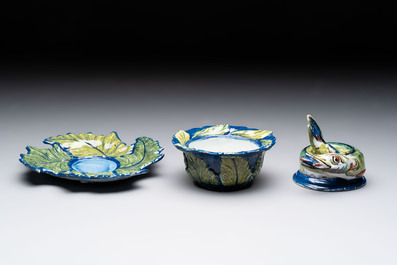 A rare polychrome Dutch Delft pike tureen and cover on stand, 18th C.