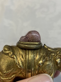 A Chinese pink quartz-inset gilt bronze elephant, 18th C.