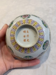 Four Chinese famille rose bowls and a blue and white bowl, Guangxu mark, 19/20th C.