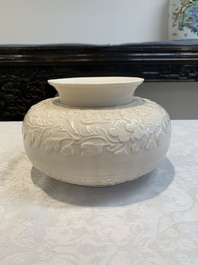 A rare Chinese Dehua blanc de Chine vase with floral design, Kangxi