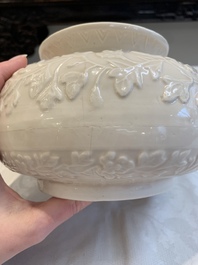 A rare Chinese Dehua blanc de Chine vase with floral design, Kangxi