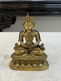 A Sino-Tibetan gilt bronze Buddha Amitayus, 18th C.