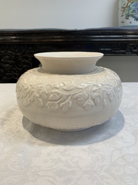 A rare Chinese Dehua blanc de Chine vase with floral design, Kangxi