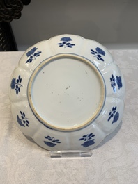 Six Chinese blue and white 'lotus' plates, Kangxi