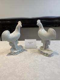 A pair of Chinese Dehua blanc de Chine models of roosters, 18th C.