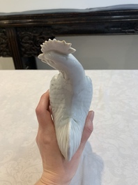 A pair of Chinese Dehua blanc de Chine models of roosters, 18th C.