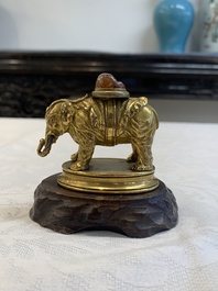 A Chinese pink quartz-inset gilt bronze elephant, 18th C.