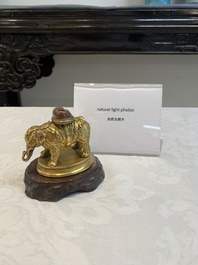 A Chinese pink quartz-inset gilt bronze elephant, 18th C.