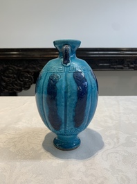 A Chinese turquoise-glazed brush rest and a Fahau vase, 18/19th C.