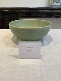 A Chinese Longquan celadon bowl with 'anhua' floral design, Ming