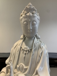 A large Chinese Dehua blanc de Chine figure of Guanyin, 19/20th C.