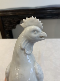 A pair of Chinese Dehua blanc de Chine models of roosters, 18th C.