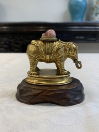 A Chinese pink quartz-inset gilt bronze elephant, 18th C.